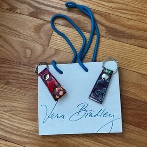 Vera Bradley Floral Wrist Key Fob Duo in Purple and Pink